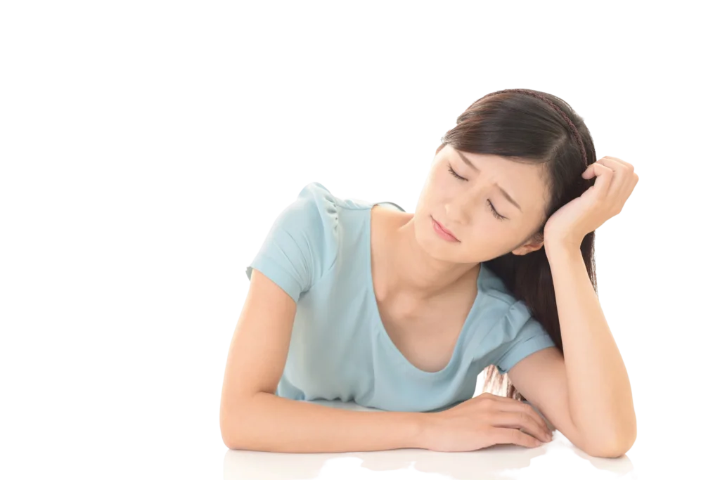 身体の不調に悩む女性